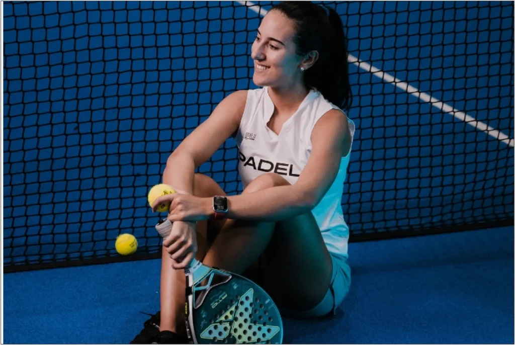 Girl in a white Padel dress.